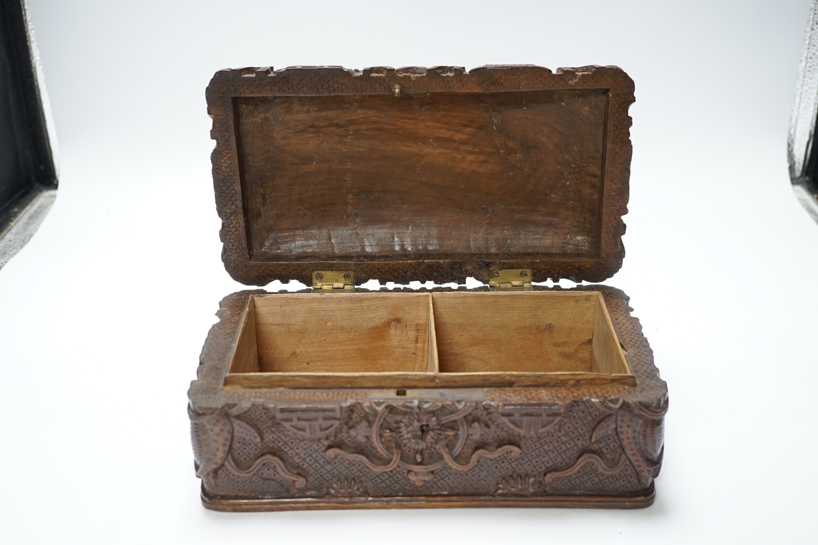 A Burmese carved teak box, early 20th century, 25cm wide x 13cm deep